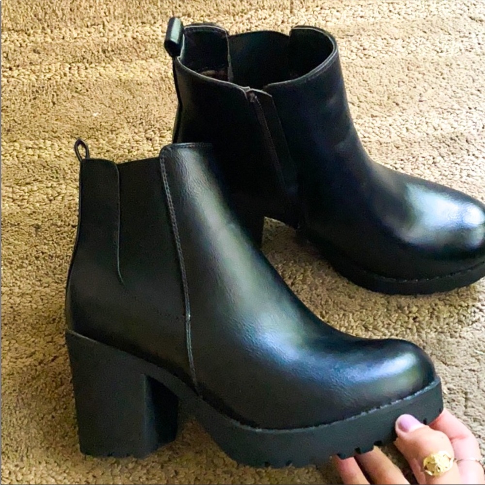Report black heeled booties
